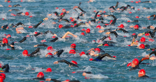 Ironman mass swim in the water